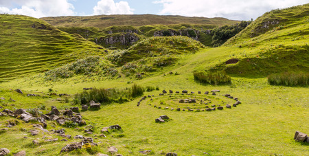 Mystic Fairy Glen, a romantic green valley with strange stone structures on the Isle of Skye, Scotlandの写真素材
