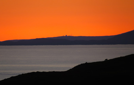 Incredibly clear and colorful sunset over the Isle of Skye, Scotlandの写真素材