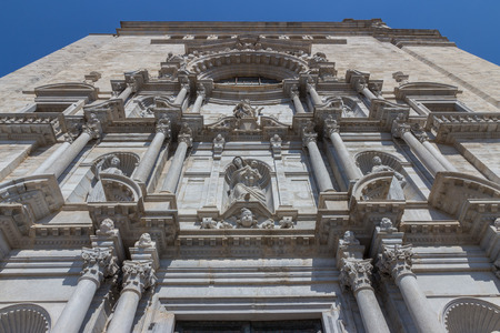 Girona cathedral front with statues and ornamentsの写真素材