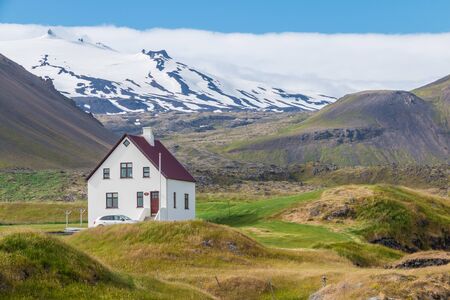 Famous building under the Snaefellsjokull volcano and glacier in Arnarstapi, Snaefellsnes peninusla,...