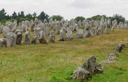 Ancient standing stones of Carnac, Brittany, northern France, a mysterious collection of huge stones from the neolithic ageの写真素材