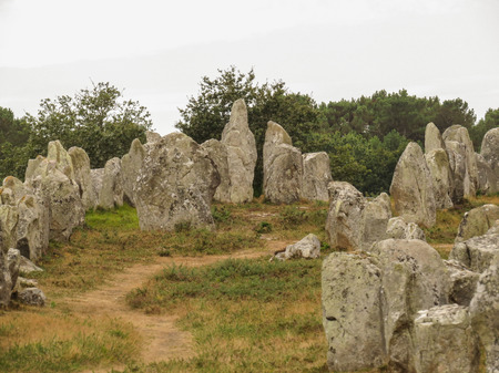 Ancient standing stones of Carnac, Brittany, northern France, a mysterious collection of huge stones from the neolithic ageの写真素材