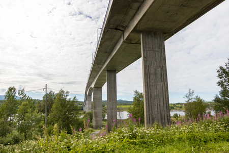 Beautifully designed bridge over famous Saltstraumen fjord and dangerous vortex near Bodo, northern Norwayの写真素材