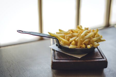French fries in pan in restaurant. Delicious french friesの写真素材