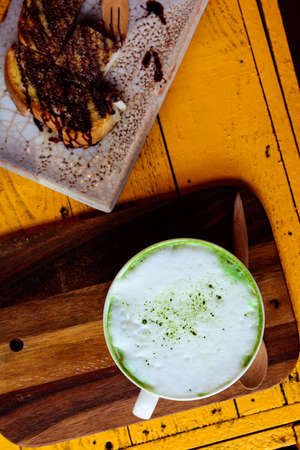 Hot green tea on the coffee tableの写真素材