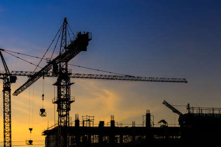 Tower cranes for construction, silhouette
