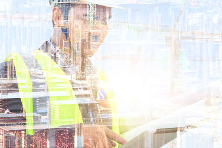Engineers and construction sites.Double exposureの写真素材