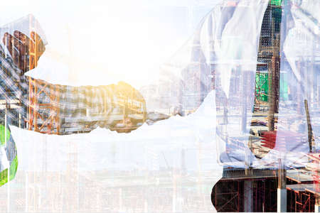 Engineers and construction sites.Double exposureの写真素材