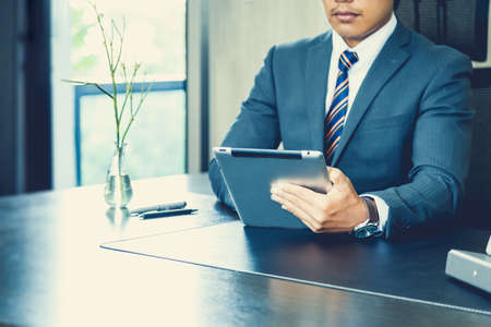 Male business man working in officeの写真素材