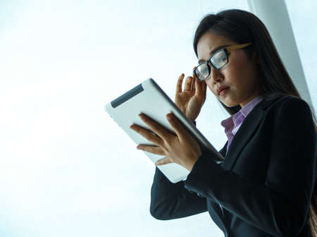 Business woman using a tablet.の写真素材