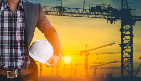 Engineer supervising building and building.