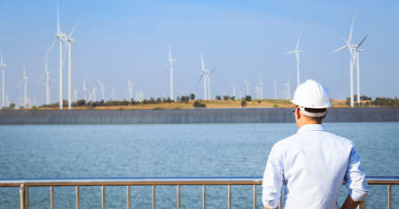 Engineers inspect the operation of wind turbines.