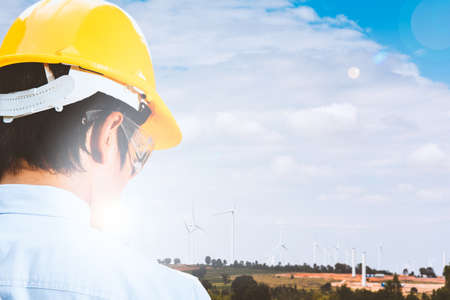 Engineers are investigating the wind turbine.