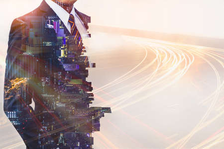 Male businessman and city and night light.