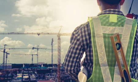 Engineers and construction of buildings and evening lighting.の写真素材