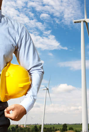 Engineers are investigating the wind turbine.の写真素材