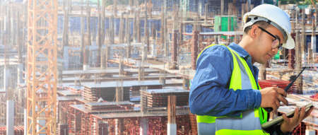 Engineers are working at building sites.の写真素材
