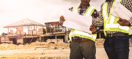 Design engineers are working at building sites.