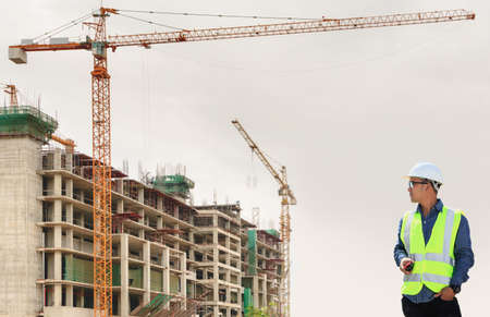 Engineers are working at building sites.の写真素材