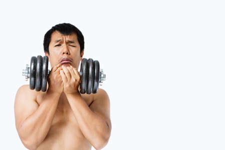 A men is lifting weights.の写真素材