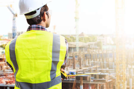 Design engineers are working at building sites.の写真素材