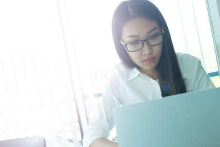 Business woman are using laptops.の写真素材