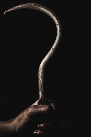 Halloween day and ghost holding a big hook.の写真素材