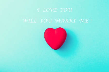 Red heart on a green background.