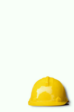 Engineer hat yellow color on white background.の写真素材