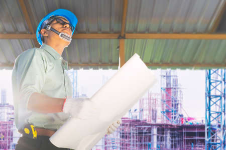 Engineers are checking the structure of the building in the construction site.