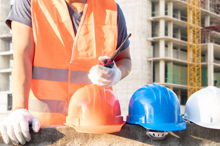 Engineers are checking the structure of the building in the construction site.