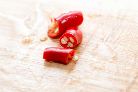 Slicing Red chili pepperの写真素材