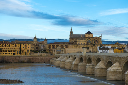 Cordoba, Spain at the Roman Bridge and Mosque-Cathedral on the Guadalquivir River.の写真素材