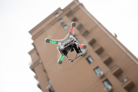 SHANGHAI,CHINA-April 30,2015:Flying drone quadcopter Dji Phantom 2 with digital camera GoPro HERO4.のeditorial素材