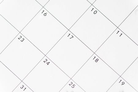 Closeup of dates on calendar pageの写真素材