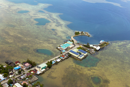 view of tropical islands and Pacific ocean from aboveの写真素材