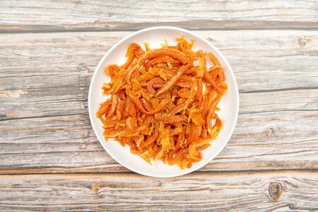 a plate of dry Carrot on tableの写真素材