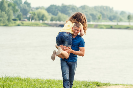 A love story couple, in love, together in the forrest park, girl, sunny evening, summerの写真素材