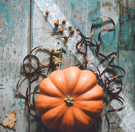 cozy background with pumpkin and ribbonsの写真素材