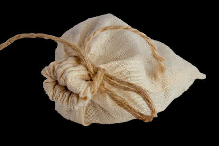 cotton bag with rope on black backgroundの写真素材