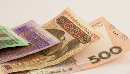 few ukrainian banknotes called hryvnias on the tableの写真素材