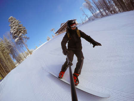 snowboarder on the slope of ski resort Bukovelの写真素材