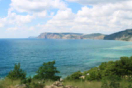 blurred sunny background of Black sea and mountaines landscapeの写真素材