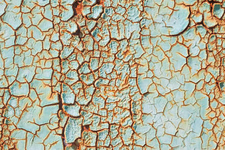 texture of old green peeling paint on metal wallの写真素材