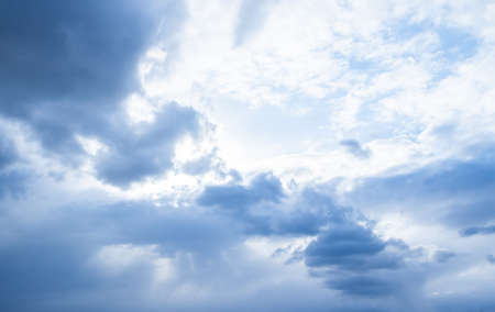 cloudy sky with sun rays can be used as backgroundの写真素材