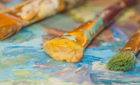 oil paints and brushes can be used as backgroundの写真素材