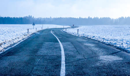 winter cold turning road can be used as backgroundの写真素材