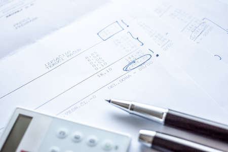 number in financial report underlined by blue pen