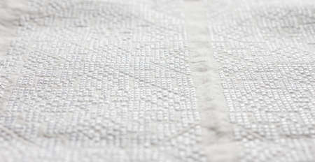 white Ukrainian cross-stitched national clothes vyshyvanka as background