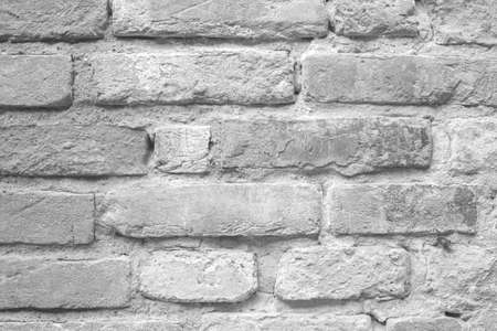 old grey brick wall can be used as backgroundの写真素材